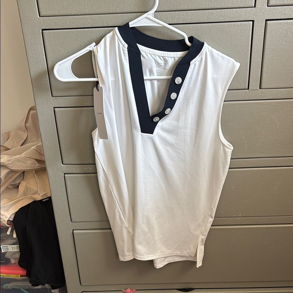 White Sleeveless Top with navy Trim